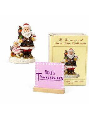 The International Santa Claus Collection Handcrafted Eskimo Santa & Snow Baby